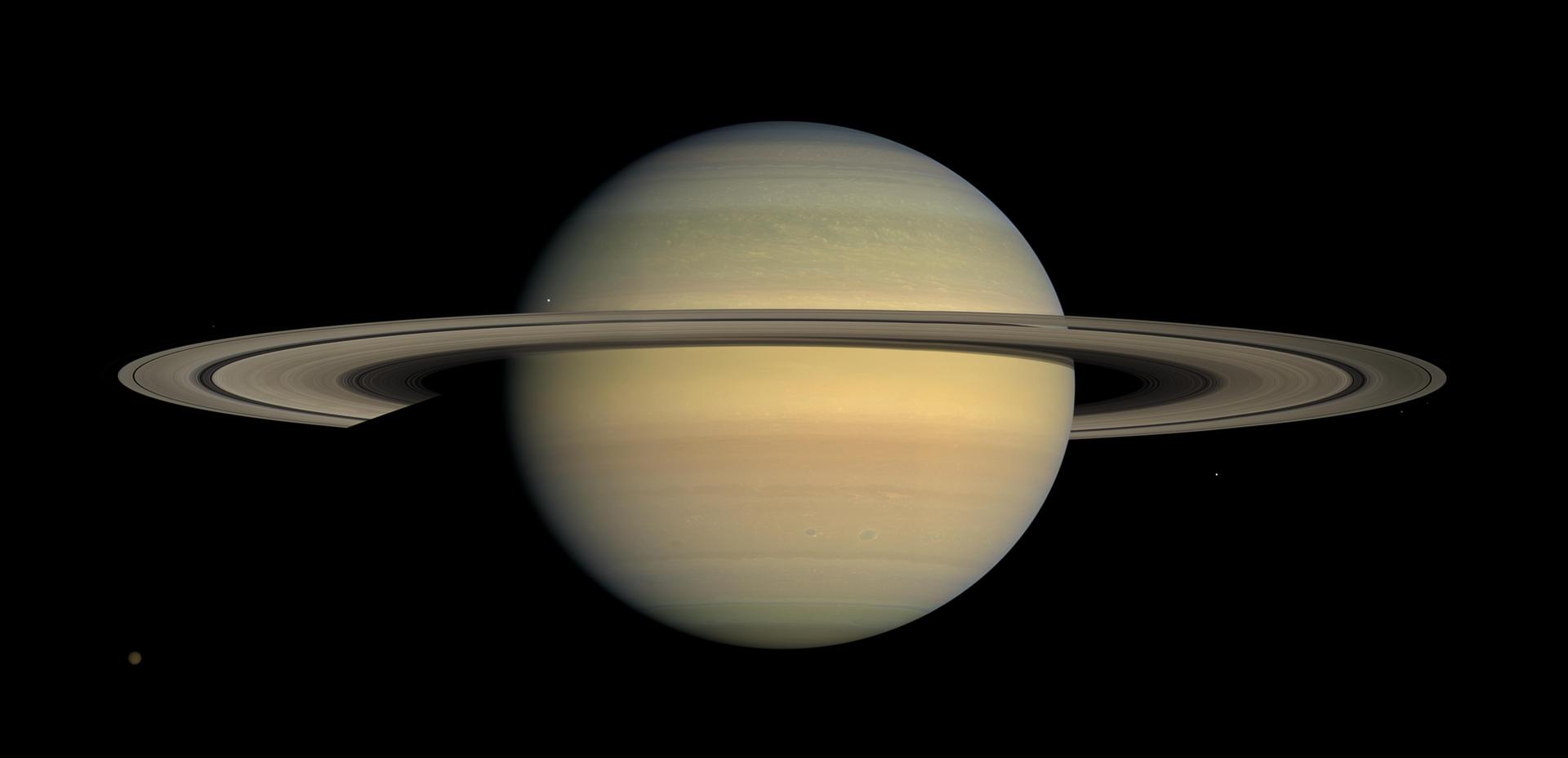 Cassini photograph of Saturn and its rings, used in the report artwork